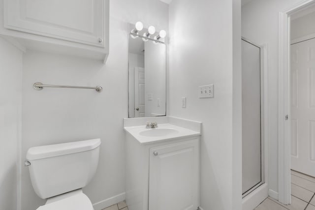 2521 Crosstimbers St Unit A3, Huntsville, TX 77320 - bathroom featuring toilet, vanity, tile patterned flooring, and a shower stall
