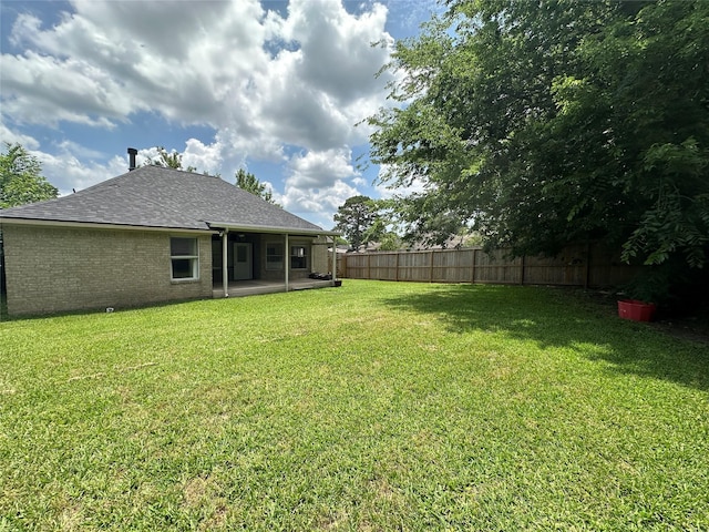 243 Fantasy Ln, Montgomery, TX 77356 - view of yard featuring a patio