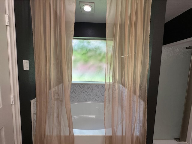 243 Fantasy Ln, Montgomery, TX 77356 - bathroom featuring a bath