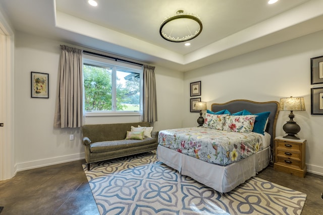 115 Hidden Hills Dr, Spicewood, TX 78669 - bedroom with baseboards, recessed lighting, concrete flooring, and a tray ceiling