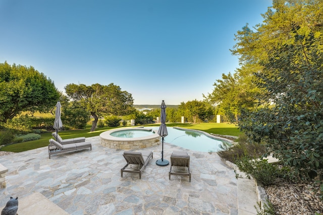 115 Hidden Hills Dr, Spicewood, TX 78669 - view of patio / terrace featuring a pool with connected hot tub