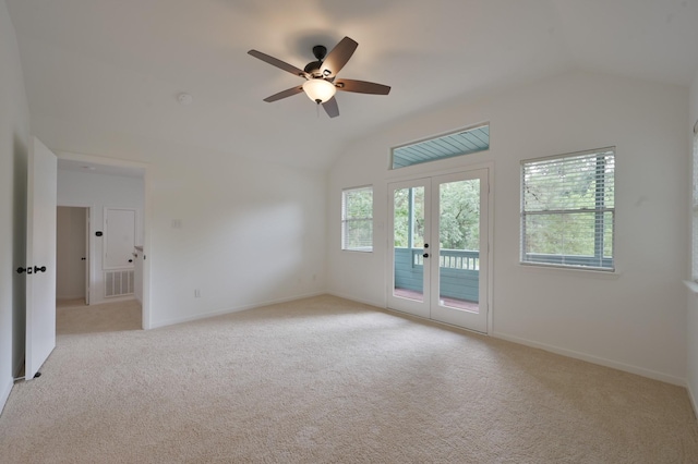 3 Shallow Pond Ct, The Woodlands, TX 77381 - empty room featuring french doors, lofted ceiling, a ceiling fan, light carpet, and baseboards