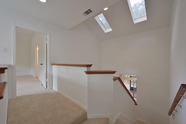 3 Shallow Pond Ct, The Woodlands, TX 77381 - stairs with a skylight, carpet flooring, vaulted ceiling, recessed lighting, and baseboards