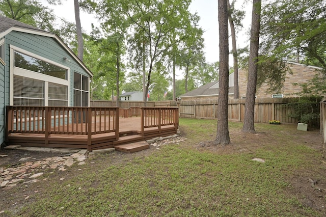 3 Shallow Pond Ct, The Woodlands, TX 77381 - view of yard featuring a wooden deck and a sunroom