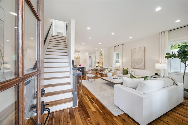 1518 31st St, Galveston, TX 77550 - living room with stairs, dark wood finished floors, recessed lighting, and a chandelier