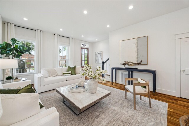 1518 31st St, Galveston, TX 77550 - living area featuring wood finished floors, recessed lighting, and baseboards