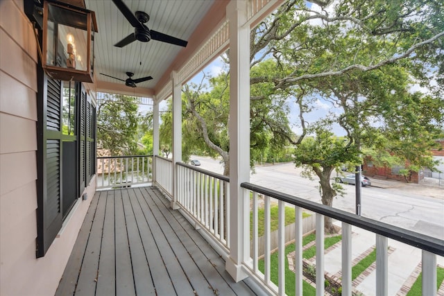 1518 31st St, Galveston, TX 77550 - wooden porch featuring ceiling fan