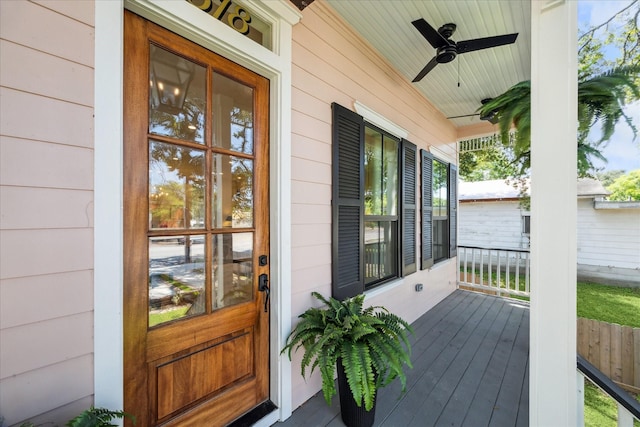 1518 31st St, Galveston, TX 77550 - view of exterior entry featuring a porch and a ceiling fan