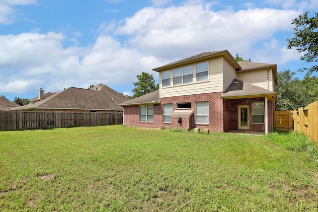 12822 Winding Manor Dr, Houston, TX 77044 - back of property featuring brick siding and roof with shingles