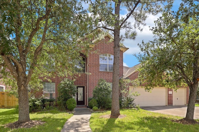 12822 Winding Manor Dr, Houston, TX 77044 - view of front of property with brick siding, driveway, and an attached garage