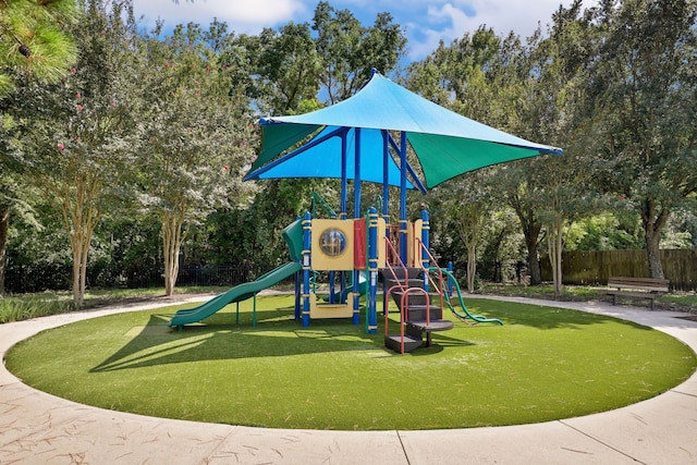 12822 Winding Manor Dr, Houston, TX 77044 - community jungle gym with view of wooded area