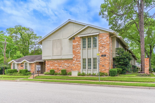 515 Tallowood Rd Unit 1, Houston, TX 77024 - view of front of property featuring brick siding