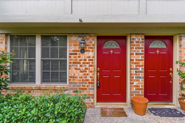 515 Tallowood Rd Unit 1, Houston, TX 77024 - entrance to property featuring brick siding and covered porch