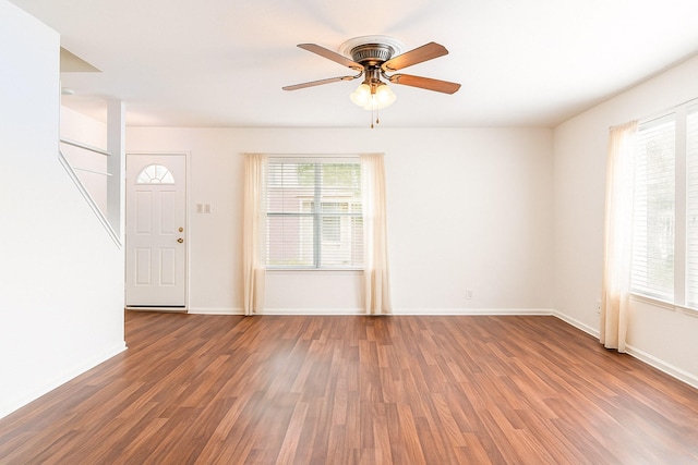 515 Tallowood Rd Unit 1, Houston, TX 77024 - empty room with wood finished floors, ceiling fan, and baseboards