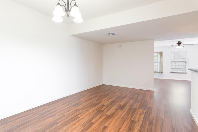 515 Tallowood Rd Unit 1, Houston, TX 77024 - empty room with a chandelier, wood finished floors, baseboards, and a ceiling fan