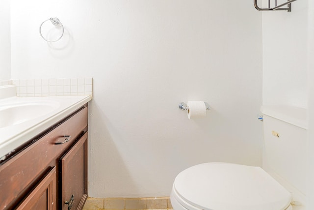 515 Tallowood Rd Unit 1, Houston, TX 77024 - half bath featuring vanity, toilet, and baseboards