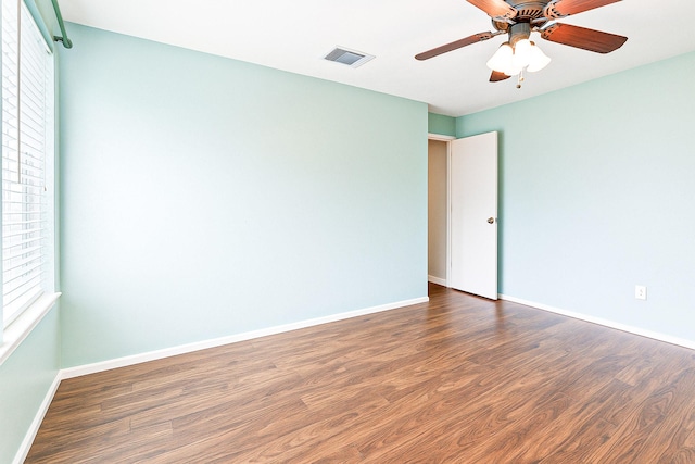 515 Tallowood Rd Unit 1, Houston, TX 77024 - unfurnished room featuring wood finished floors, baseboards, and ceiling fan