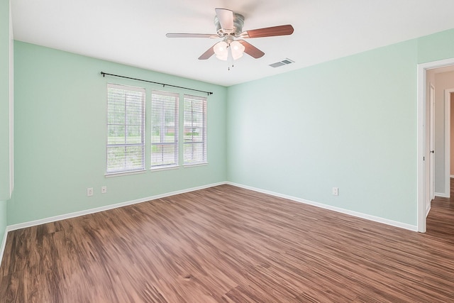 515 Tallowood Rd Unit 1, Houston, TX 77024 - spare room with ceiling fan, baseboards, and wood finished floors