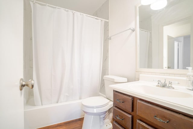 515 Tallowood Rd Unit 1, Houston, TX 77024 - bathroom featuring vanity, toilet, shower / bath combination with curtain, and wood finished floors