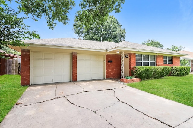 315 Eastlake St, Houston, TX 77034 - single story home with a garage, brick siding, and concrete driveway