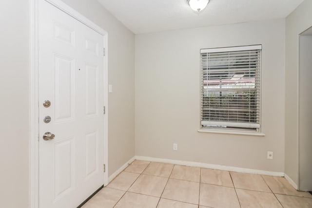 315 Eastlake St, Houston, TX 77034 - spare room with light tile patterned flooring and baseboards