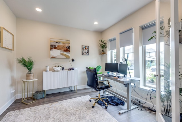 546 Carina Gaze Dr, Willis, TX 77318 - office space with wood finished floors, recessed lighting, and baseboards