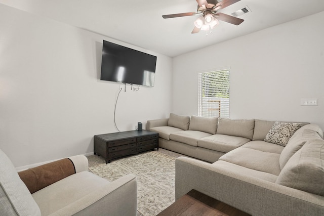 12022 Fletching Stone Ln, Houston, TX 77044 - living room with ceiling fan and baseboards