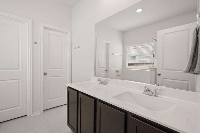 12022 Fletching Stone Ln, Houston, TX 77044 - full bath featuring double vanity and tile patterned floors