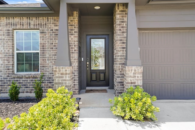12022 Fletching Stone Ln, Houston, TX 77044 - view of exterior entry featuring brick siding