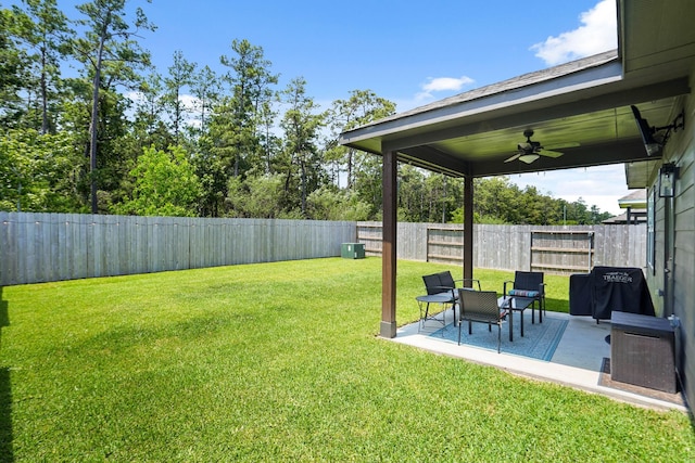 12022 Fletching Stone Ln, Houston, TX 77044 - view of yard featuring ceiling fan and a patio