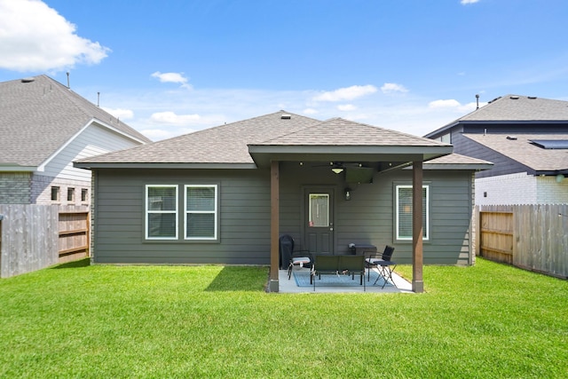 12022 Fletching Stone Ln, Houston, TX 77044 - back of property featuring a ceiling fan, a patio, and a shingled roof