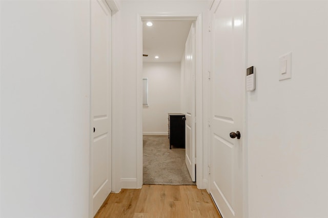 7810 Kenton St, Houston, TX 77028 - corridor with light wood finished floors, recessed lighting, and baseboards