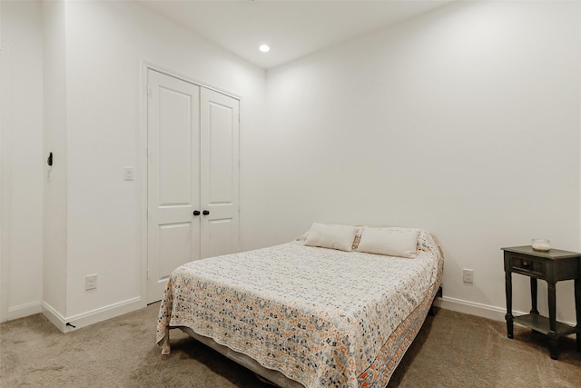 7810 Kenton St, Houston, TX 77028 - bedroom featuring carpet, baseboards, a closet, and recessed lighting