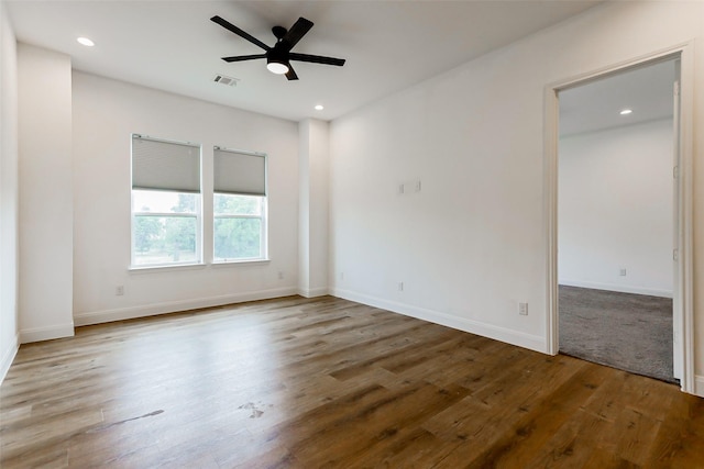 7810 Kenton St, Houston, TX 77028 - unfurnished room with wood finished floors, a ceiling fan, recessed lighting, and baseboards