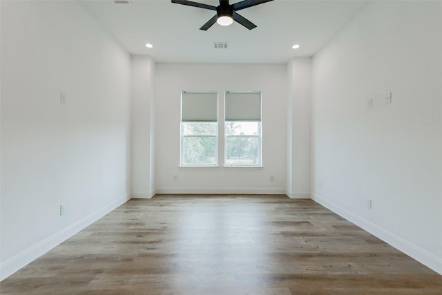 7810 Kenton St, Houston, TX 77028 - spare room featuring ceiling fan, wood finished floors, recessed lighting, and baseboards