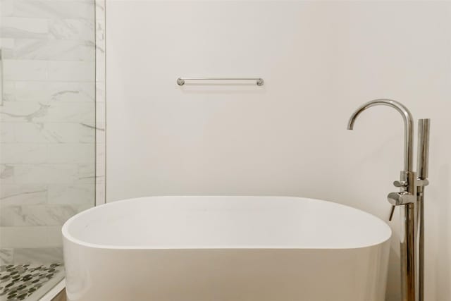 7810 Kenton St, Houston, TX 77028 - bathroom with a freestanding tub and a tile shower