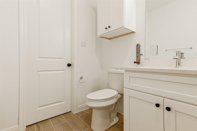 7810 Kenton St, Houston, TX 77028 - half bath with vanity, toilet, and baseboards