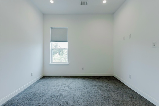 7810 Kenton St, Houston, TX 77028 - carpeted spare room featuring baseboards and recessed lighting