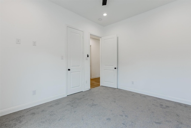 7810 Kenton St, Houston, TX 77028 - unfurnished room with carpet floors, baseboards, ceiling fan, and recessed lighting
