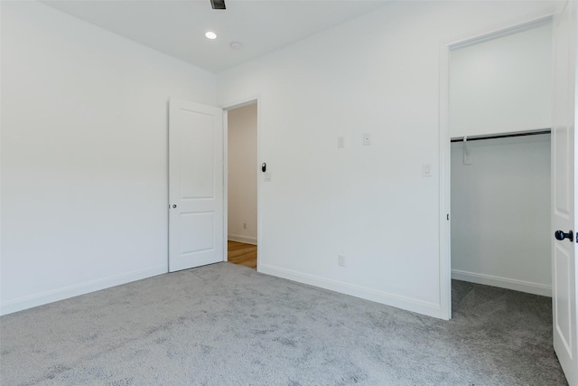 7810 Kenton St, Houston, TX 77028 - unfurnished bedroom featuring carpet, baseboards, a closet, and recessed lighting