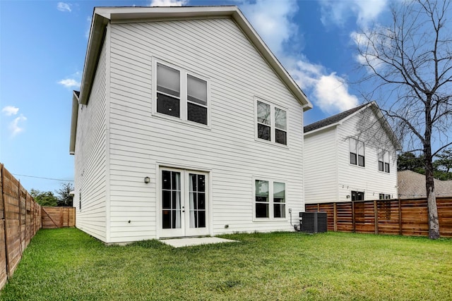 7810 Kenton St, Houston, TX 77028 - rear view of property with french doors and central air condition unit