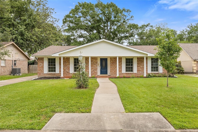 18215 Hereford Ln, Houston, TX 77058 - ranch-style house featuring brick siding, cooling unit, covered porch, and a front yard