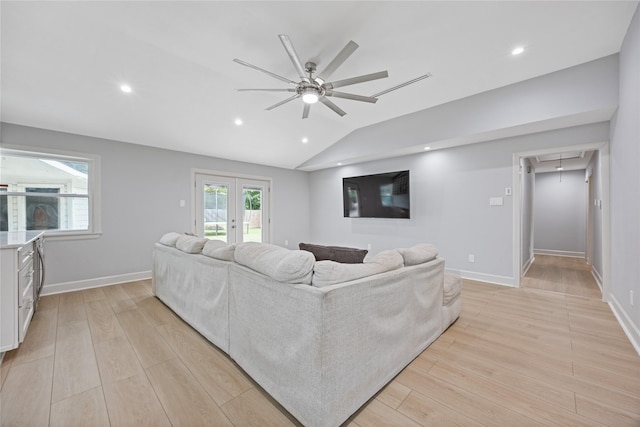 18215 Hereford Ln, Houston, TX 77058 - living area featuring attic access, ceiling fan, light wood-type flooring, vaulted ceiling, and french doors