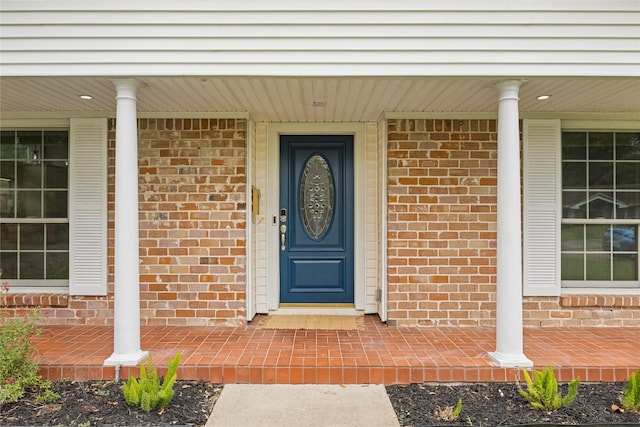 18215 Hereford Ln, Houston, TX 77058 - property entrance featuring a porch and brick siding