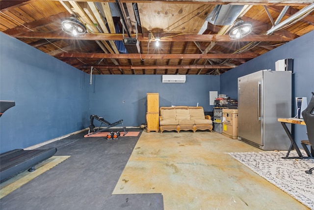 18215 Hereford Ln, Houston, TX 77058 - garage with freestanding refrigerator, a wall mounted air conditioner, and a garage door opener