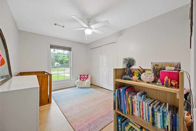 18215 Hereford Ln, Houston, TX 77058 - bedroom featuring a closet, light wood finished floors, and a ceiling fan