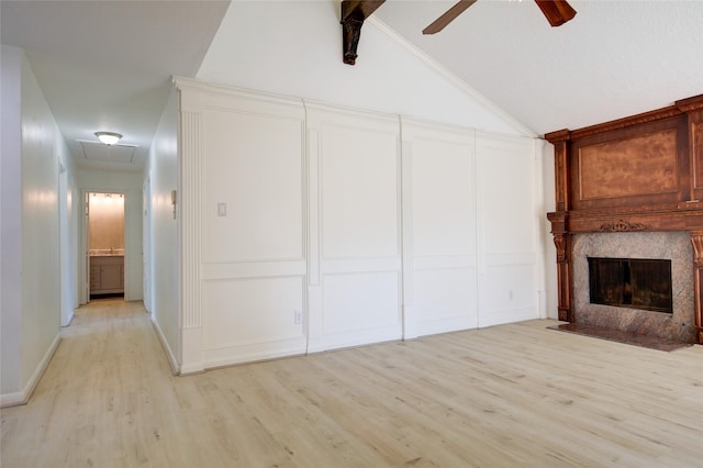 15803 Pryor Dr, Houston, TX 77489 - unfurnished living room featuring attic access, light wood finished floors, ceiling fan, and a fireplace