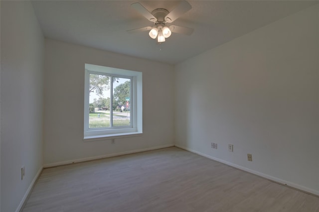 15803 Pryor Dr, Houston, TX 77489 - unfurnished room featuring wood finished floors, a ceiling fan, and baseboards