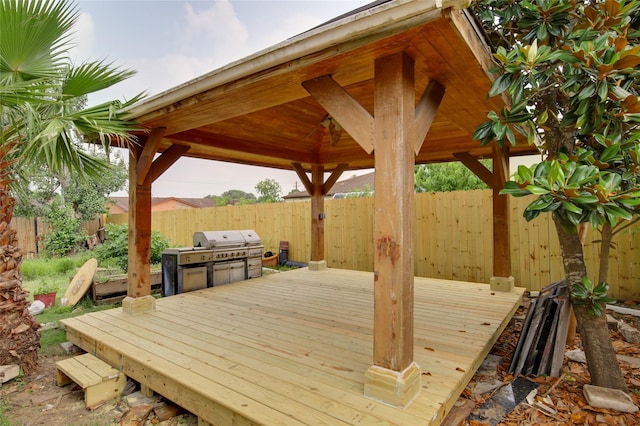 15803 Pryor Dr, Houston, TX 77489 - wooden terrace featuring a gazebo, a fenced backyard, and grilling area