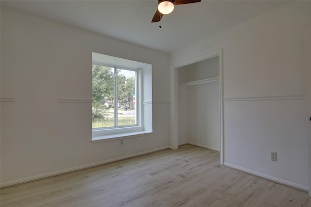 15803 Pryor Dr, Houston, TX 77489 - unfurnished bedroom with light wood-style flooring, ceiling fan, baseboards, and a closet